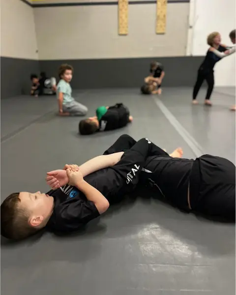 Kids drilling on the mat